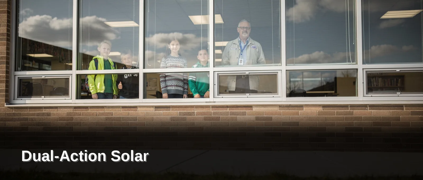 Illustration of school glazing with window film, with article title